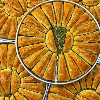 

Traditional fresh delicious Turkish Carrot Slice baklava with pistachio. Dessert Baklava Famous Brand Turkish Baklava pistachio