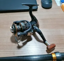 Conjunto de caña de pescar telescópica, engranaje giratorio de carrete de pesca, carrete y caña de pescar