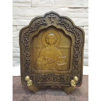 

Carved icon Panteleymon healer in a rounded frame 20-23