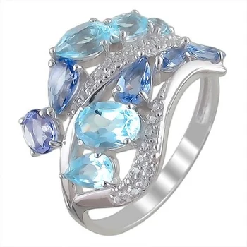 

Jewelry Tradition ring with cubic zirconia, tanzanites and Topaz Silver
