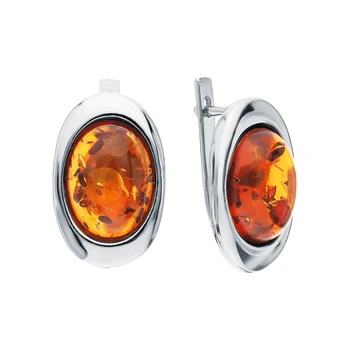 

Silver earrings with amber sunlight