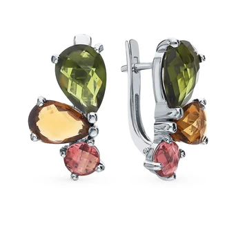 

Silver earrings with jewelry glasses sunlight sample 925