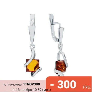 

Silver earrings with amber sunlight