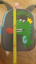 Mochila de grado alto para bebés y niñas, morral escolar 3D antipérdida con dibujos animados para guardería, impermeable de dinosaurios