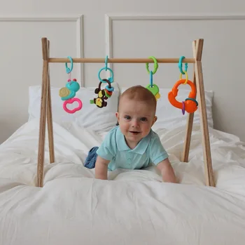 

Children's Educational Stand-training device hanging toys Millwood. Bed Bell for children "вырастайка"-Birch