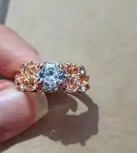 Anillo de compromiso con incrustaciones de zirconia para mujer, sortija de boda de Color oro rosa con diseño hueco para mujer, con diamantes de imitación
