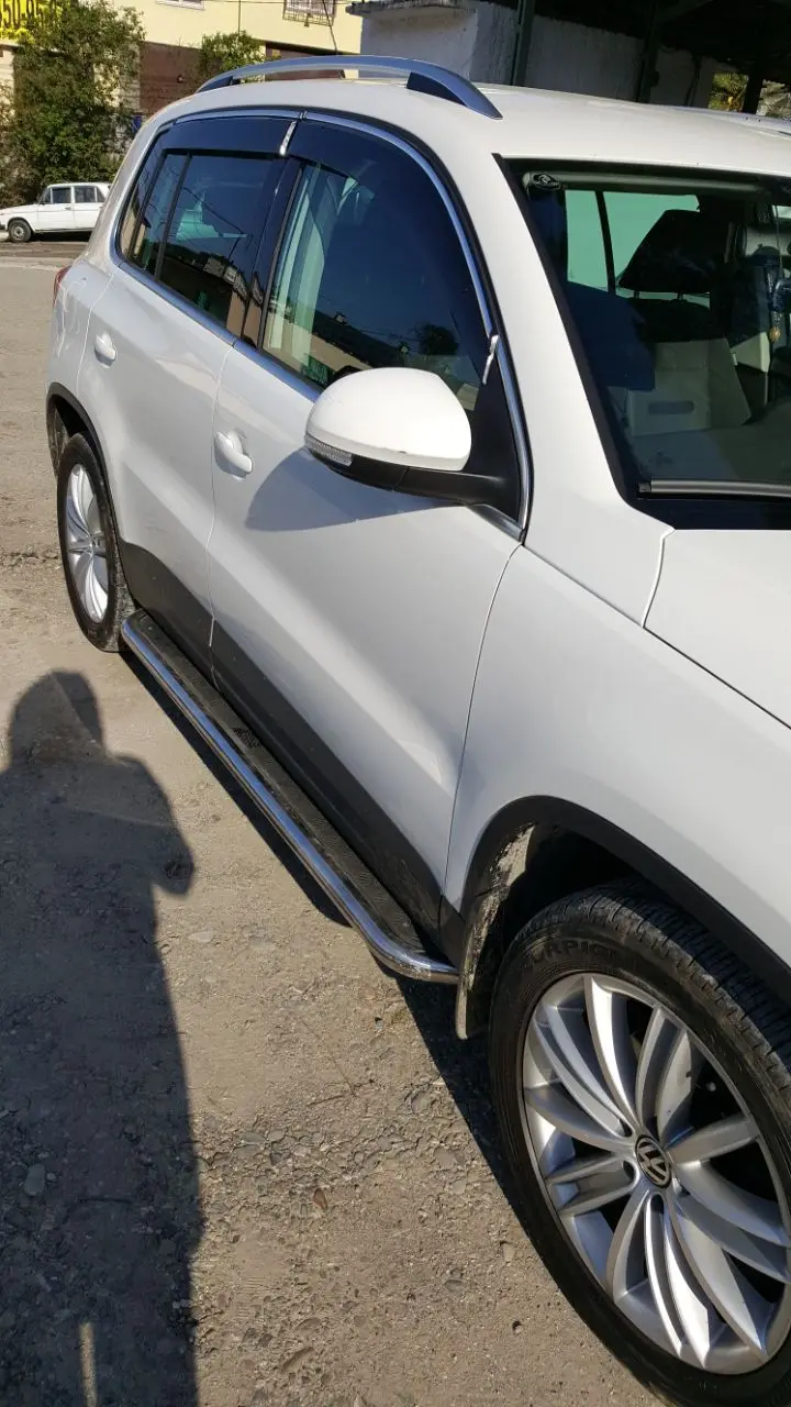 Пороги подножки для Volkswagen Tiguan+ из нержавеющей стали со штатными креплениями