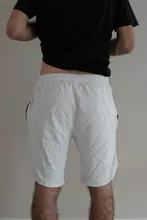 Pantalones cortos de culturismo para hombre, pantalones cortos masculinos de estilo veraniego para ejercicio de gimnasio, ropa deportiva de secado rápido de malla transpirable apta para correr