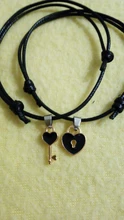 Conjunto de 2 uds. De pulsera de moda para parejas, brazalete de cuerda de diseño de Color negro con llave de bloqueo, joyas de envío al por mayor y directo