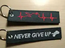 1 cadena de PC llavero llave de lanzamiento cadena Bijoux llaveros para motos y coches negro etiqueta para llave bordado llaveros