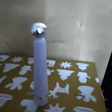 Mini eléctrico vibrador masajedaor de ojos Anti-envejecimiento arrugas círculo oscuro pluma de rejuvenecimiento belleza pluma portátil