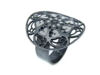 

Sterling silver ring with black rhodium and white enamelled hearts