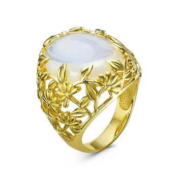 

925 sterling silver ring with stones: synth Moonstone.