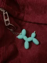 Nuevo creativo de dibujos animados globo de Llavero perro colgante anillo de hombres y mujeres par bolsa de llavero colgante venta al por mayor
