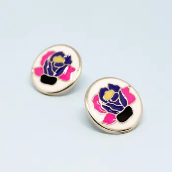 

Set of round stud earrings and pendant on chain: flowers on white background (52516)