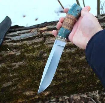 

Forged knife beam with a blade of steel x12mf