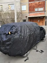 X Autohaux-Cubierta de tela impermeable para el coche, funda universal transpirable, con espacio para los espejos, en color negro, ofrece una protección tanto en invierno como en verano