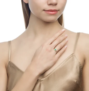 

Gold ring with emerald and diamonds sunlight sample 585