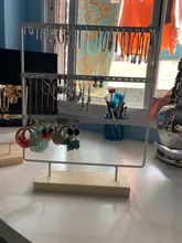 Soporte de exhibición para pendientes de tuerca de Metal con Base de madera, organizador de pendientes con 24/44/66 agujeros, venta al por mayor