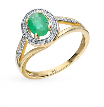 

Gold ring with emerald and diamonds sunlight