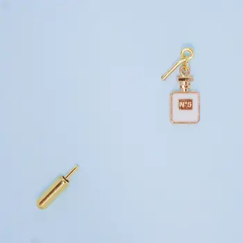 

Brooch on lapel perfume 50997 (white, needle, jewelery alloy)