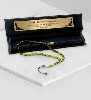 

Tailor-made In Leather Box Capsule Cut Mossy Amber Rosary