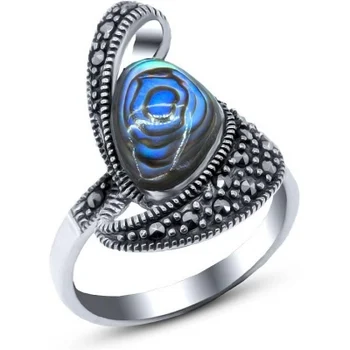 

Silver Wings ring with mother of pearl and marcasite in silver