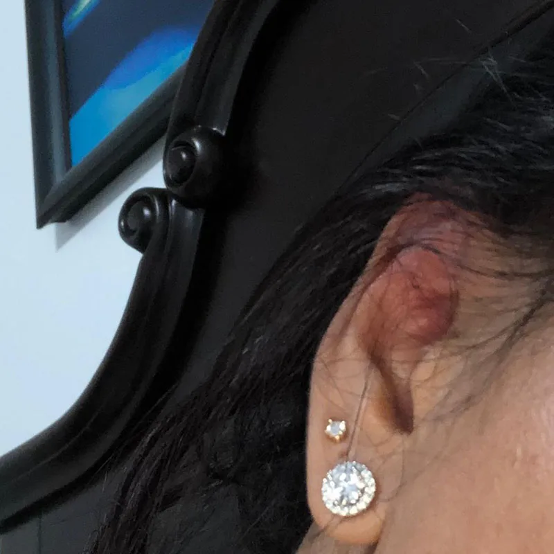 Серьги гвоздики NiceGems из белого золота 585 пробы с круглым муассанитом 14