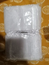 100pcs / lot 5x7 7x9 9x12 10x15cm Bolsas de organza con cordón Bolsas de embalaje de joyería Bolsa de regalo de fiesta de boda Bolsas de regalo de cumpleaños de Navidad Bolsas