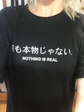 Nada es Real T camisa Harajuku japonés divertido algodón Tops con letra impresa Tee de algodón transpirable Hipster camiseta de la nave de la gota