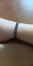 Pulsera de Metal elástica para hombre y mujer, brazalete redondo de piedra natural negra para la pérdida de peso, terapia magnética, hematita, moda