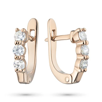 

Earrings in red gold with a diamond