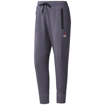 

Reebok model RC SpeedWick Jogger reference CD6463 color SMOVOL. Pants for women. 60% cotton/40% polyester