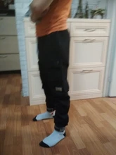 Pantalones Cargo de harén con bolsillos laterales para hombre, pantalón negro de Hip-Hop, informal, a la moda, ropa de calle, 2020 cintas