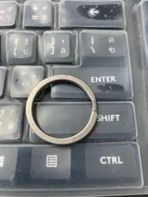 Llaveros de aleación de titanio para hombre, llaveros de anillos pendiente hebilla superligero para coche, regalo creativo masculino, venta al por mayor