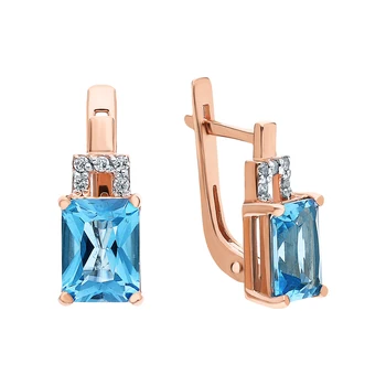 

Gold earrings with Topaz and cubic zirconia sunlight sample 585
