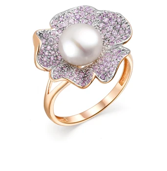 

Gold ring with cubic zirconia and pearls sunlight