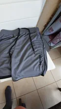 Pantalones cortos de culturismo para hombre, pantalones cortos masculinos de estilo veraniego para ejercicio de gimnasio, ropa deportiva de secado rápido de malla transpirable apta para correr