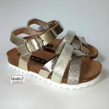 

Sandals platinum skin three strap and buckle, Dobsons.com