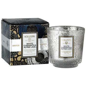 

Voluspa scented candle is white currant and Alpine Lace in small candle holder and box