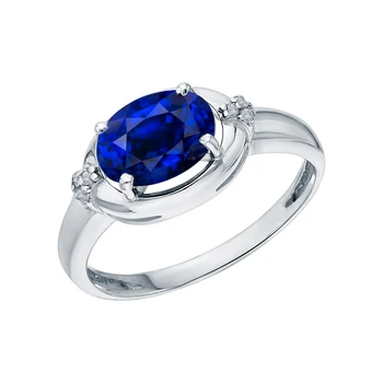 

Silver ring with cubic zirconia and Sapphire synthetic sunlight sample 925