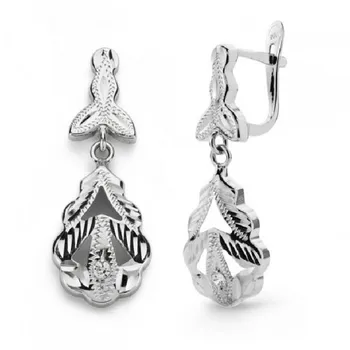 

18K WHITE GOLD CUBAN 27X10 MM.