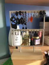 Soporte de exhibición para pendientes de tuerca de Metal con Base de madera, organizador de pendientes con 24/44/66 agujeros, venta al por mayor