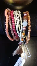 Joyería Bohemia de tejido elástico multicapa para mujer, pulseras y brazaletes con borla de hoja, brazalete envolvente con dije