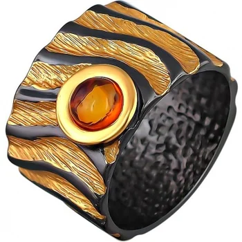 

Esthete ring with Amber made of black silver with gilding