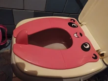 Asiento de entrenamiento para el baño asiento de inodoro portátil, Material PP para niños pequeños con bolsa de transporte y 10 paquetes de fundas desechables para asientos de inodoro (rosa)