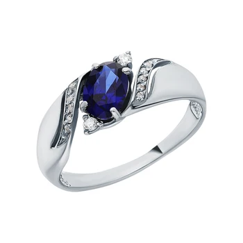 

Silver ring with cubic zirconia and Sapphire synthetic sunlight sample 925