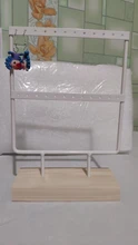 Soporte de exhibición para pendientes de tuerca de Metal con Base de madera, organizador de pendientes con 24/44/66 agujeros, venta al por mayor