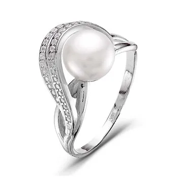 

Silver ring with cubic zirconia and pearls
