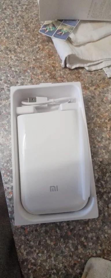 Отзыв о товаре Фотопринтер Xiaomi Mijia 300 точекдюйм Mi, портативный карманный мини-принтер для смартфонов, работает с приложением Mi Home от пользователя Покупатель 